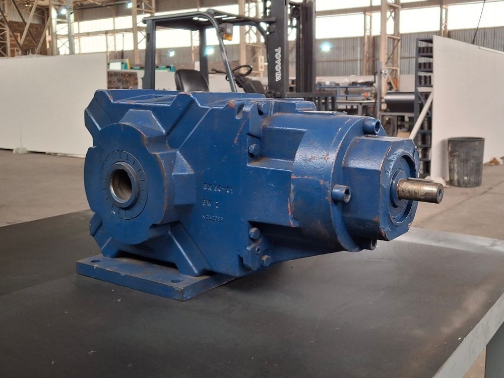 Sizwe Seals Springs - Gearbox Repairs and Refurbishments Arrangement of mechanical seals, springs and industrial sealing components on a workshop table, representing industrial sealing solutions and maintenance